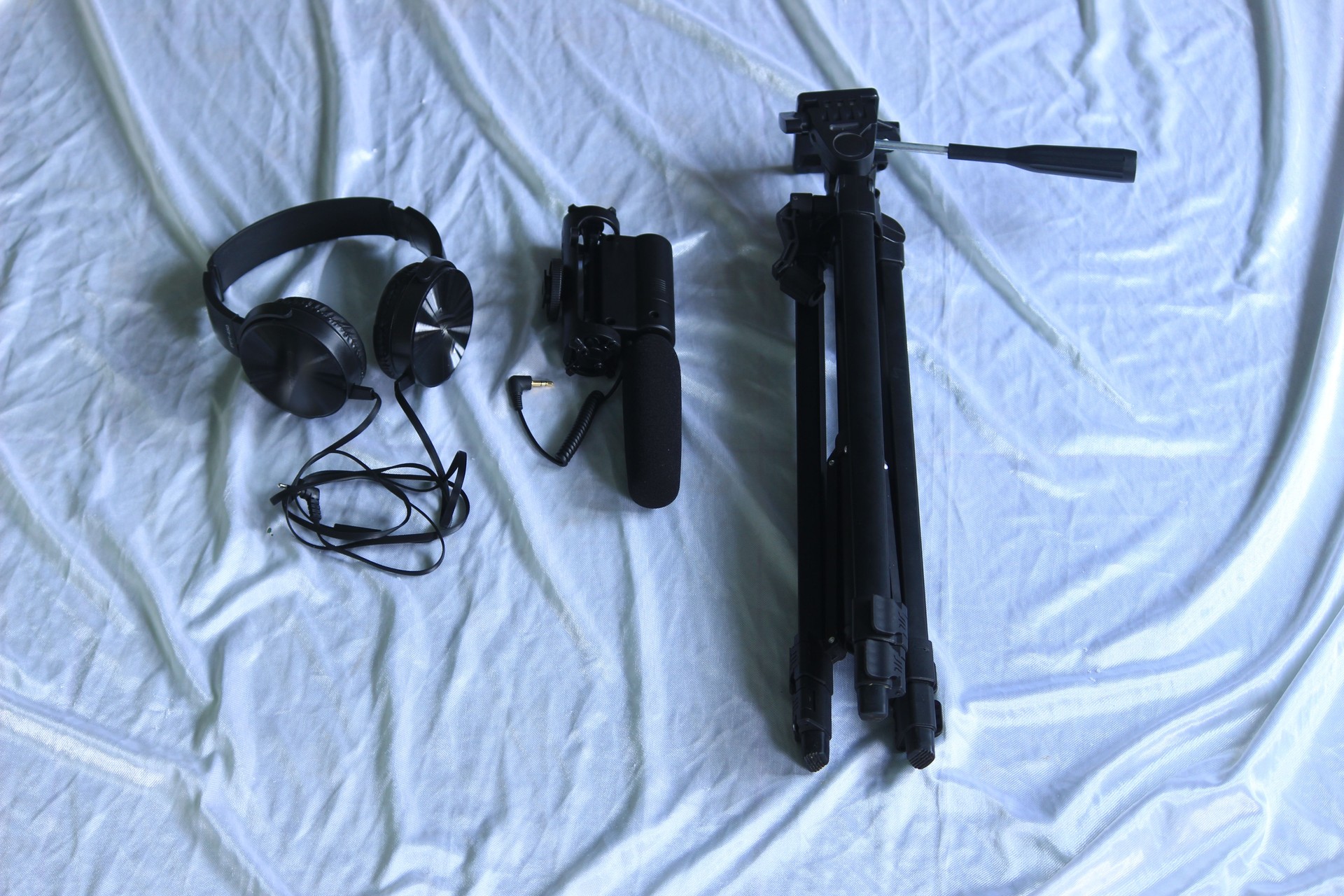 photo, video, and recording equipment include microphones, headphones, tripods.
